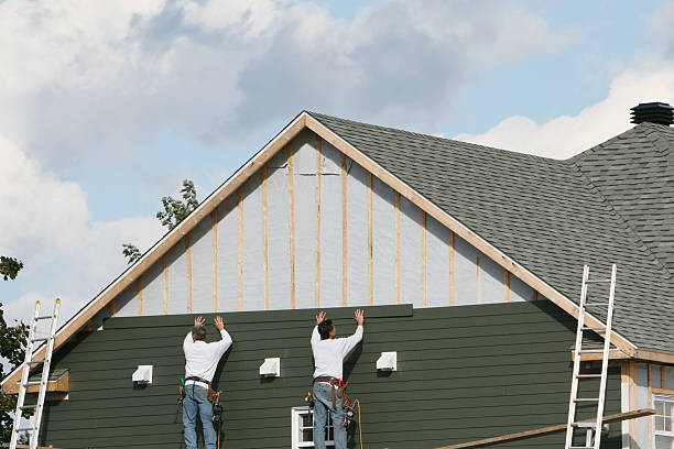 Professional Siding technician working in Lucama, NC